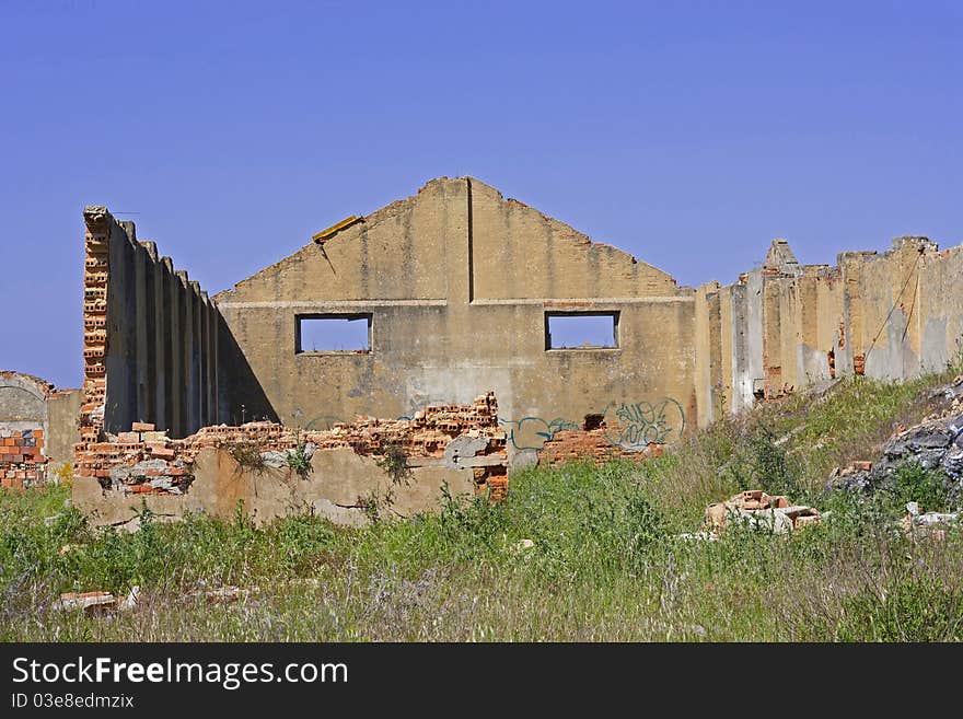 Old house destroyed; demolished building with only to walls