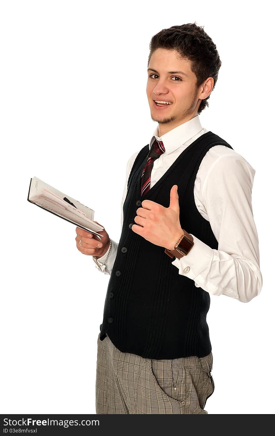 Businessman writing a daily plan of action in his notebook. Businessman writing a daily plan of action in his notebook