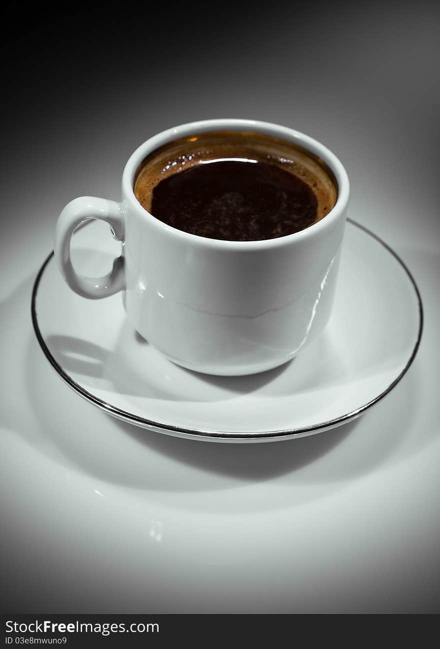 Studio shot
white ceramic cup with coffe
on the abstract dark gradient gray background. Studio shot
white ceramic cup with coffe
on the abstract dark gradient gray background