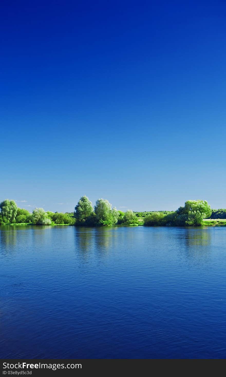 Close up vertical view on river and coast