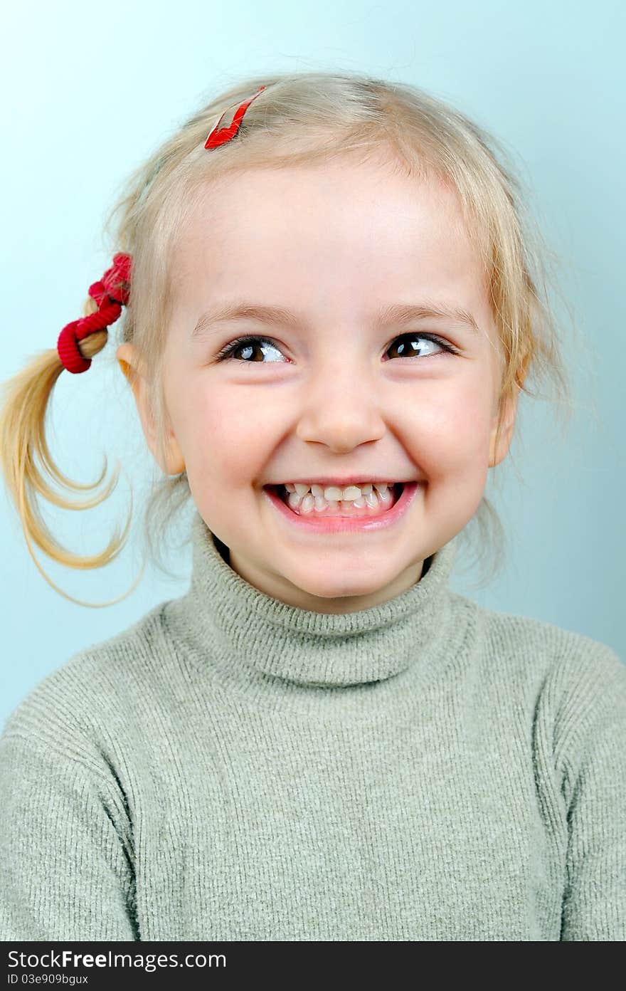 Portrait of lovely blond little girl