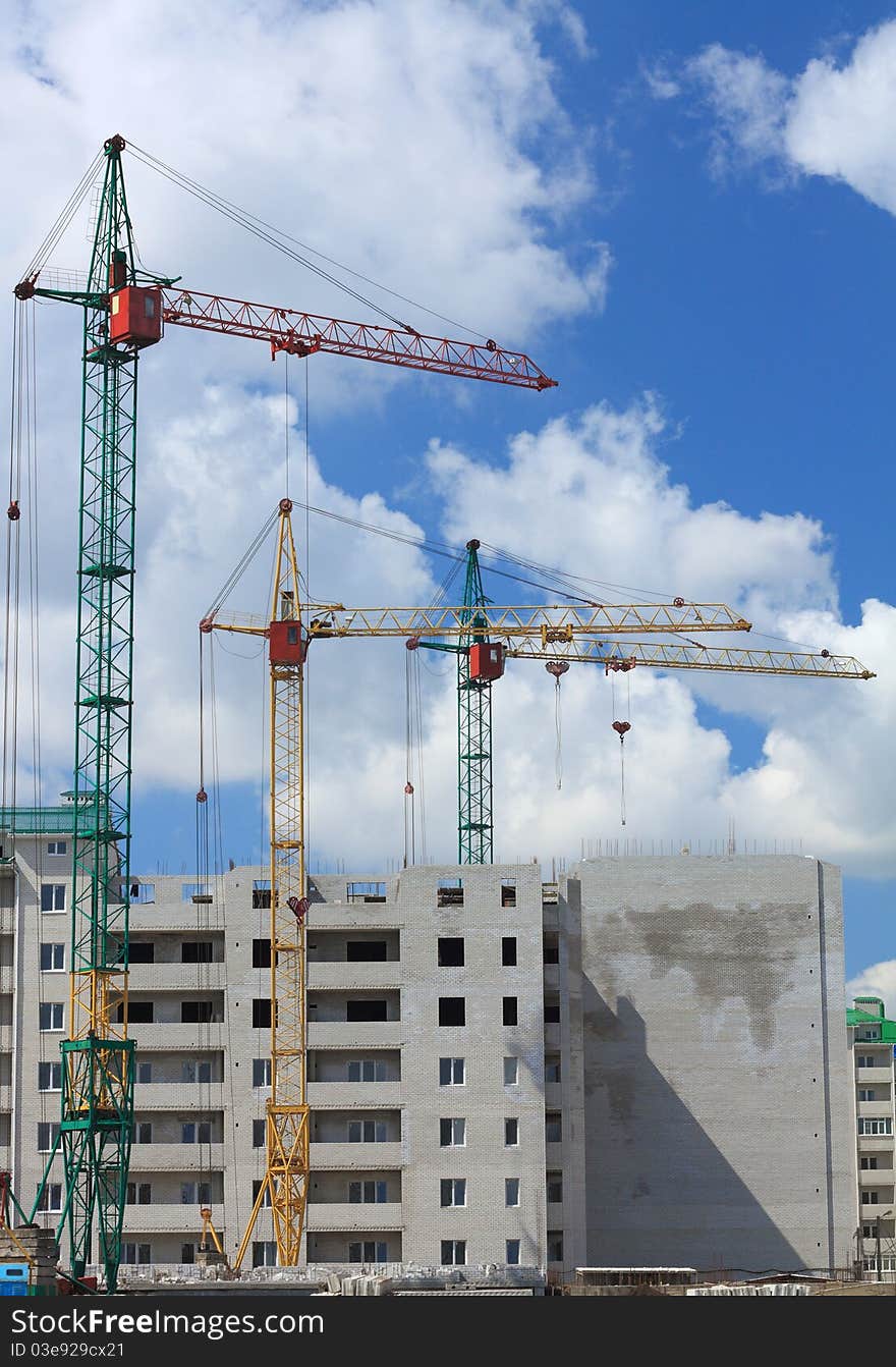 Construction of new brick high-rise building. Construction of new brick high-rise building