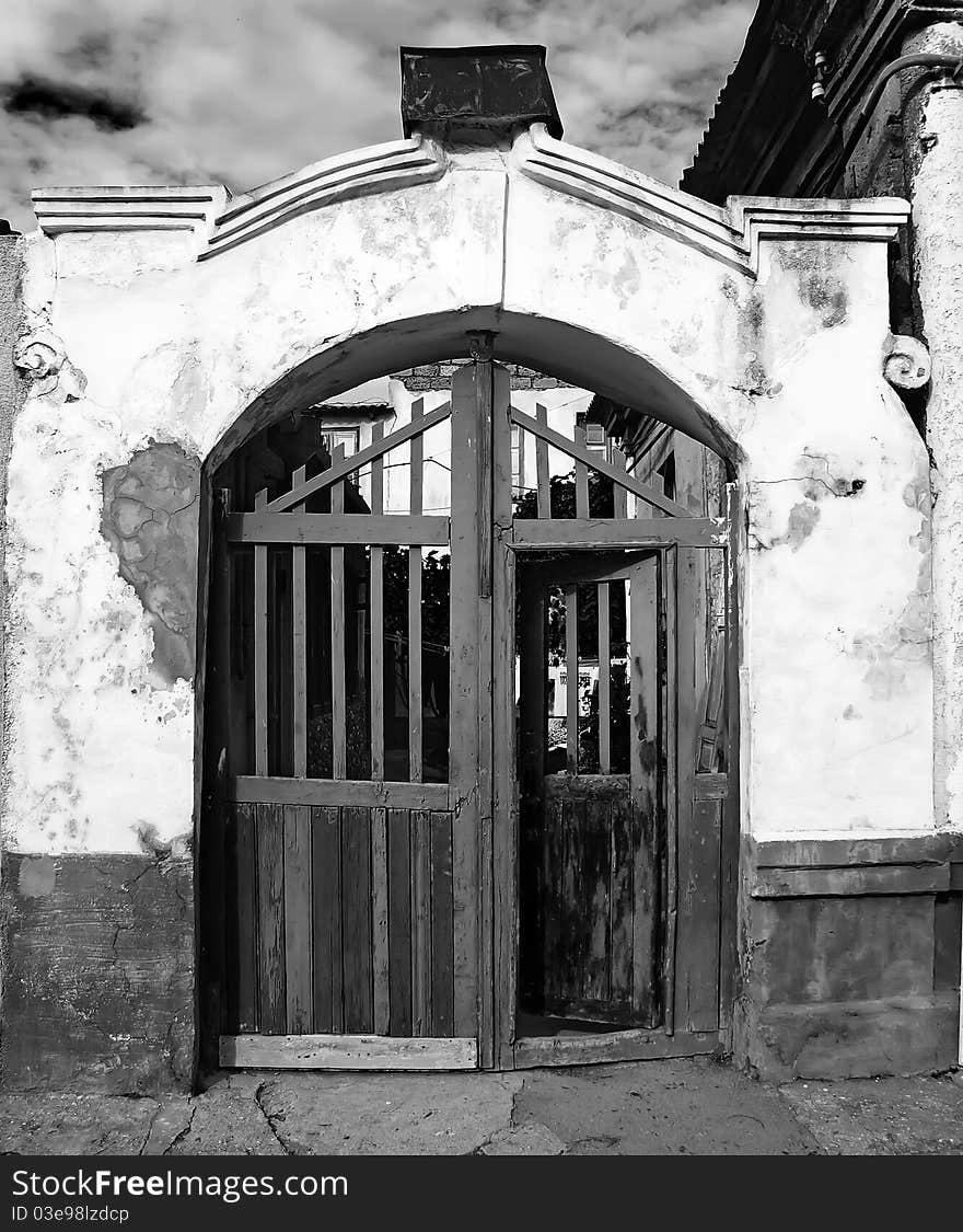 Vintage entrance to an old house. Black and white image