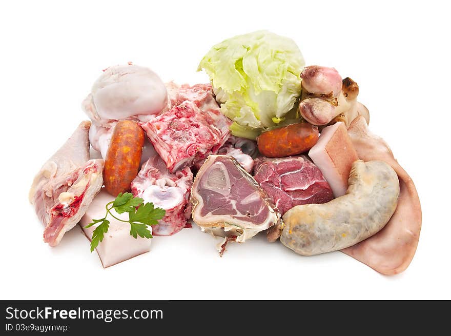 Meat, bones and vegetables isolated on white background. Meat, bones and vegetables isolated on white background