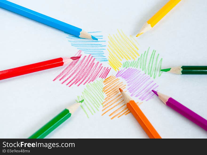 Colored pencils isolated in white