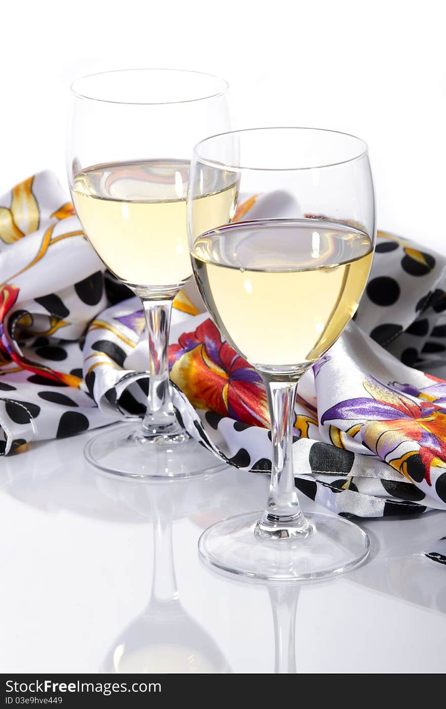 Two Glasses Of Wine And A Scarf