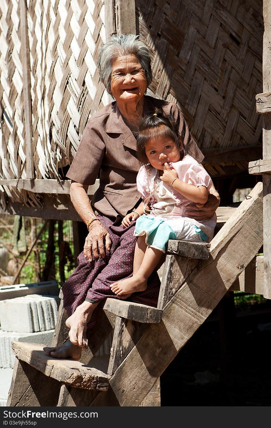 Asian grandmother with granddaughter, portrait of asian people