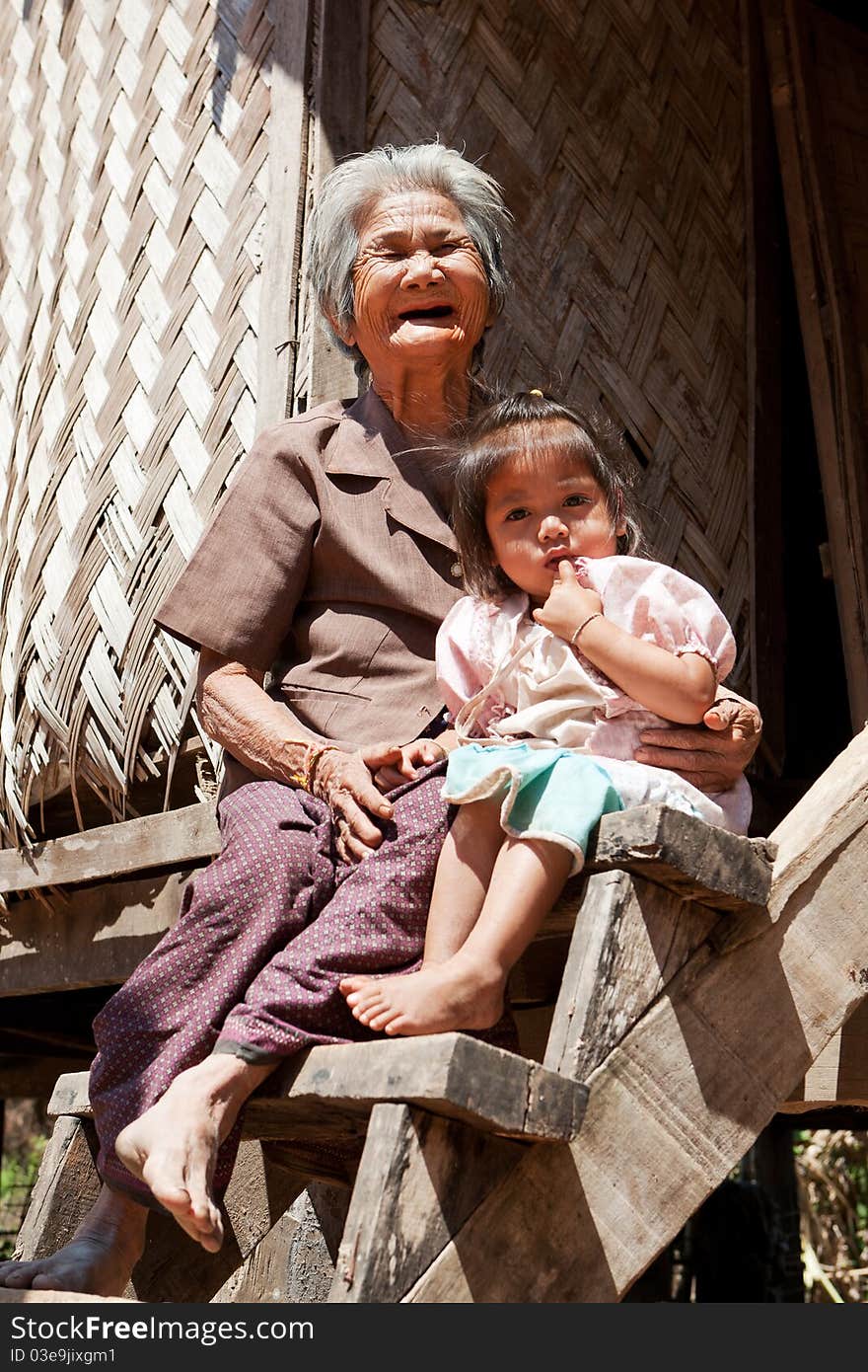 Asian grandmother with granddaughter, portrait of asian people