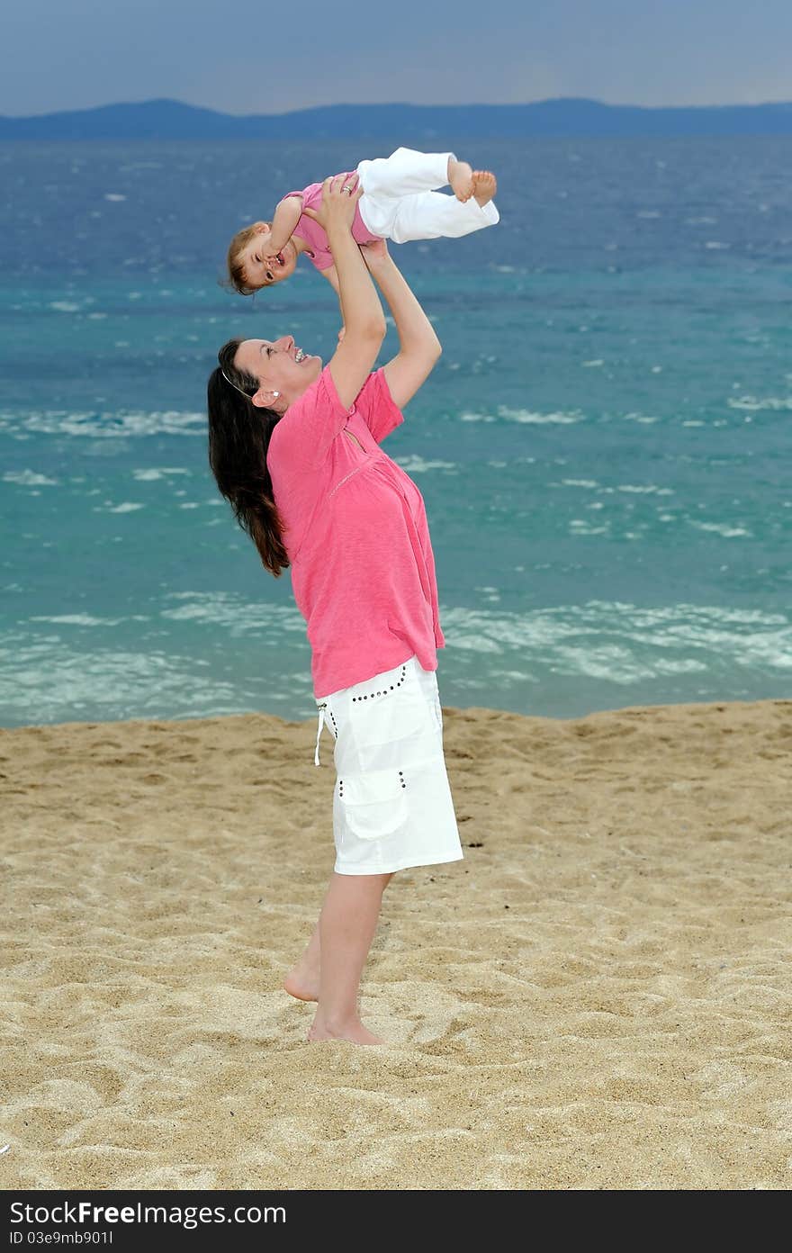 Mother with her baby at beach