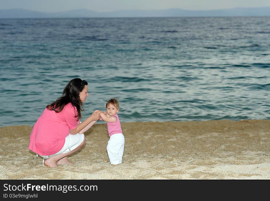 Mother with her baby at beach