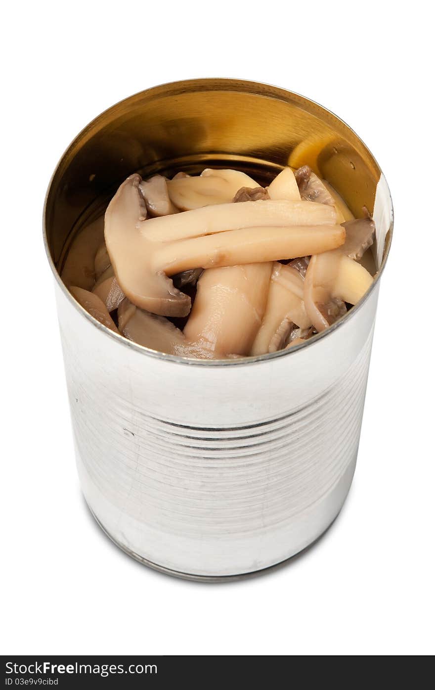 Canned preserved champignon mushrooms on white. Canned preserved champignon mushrooms on white