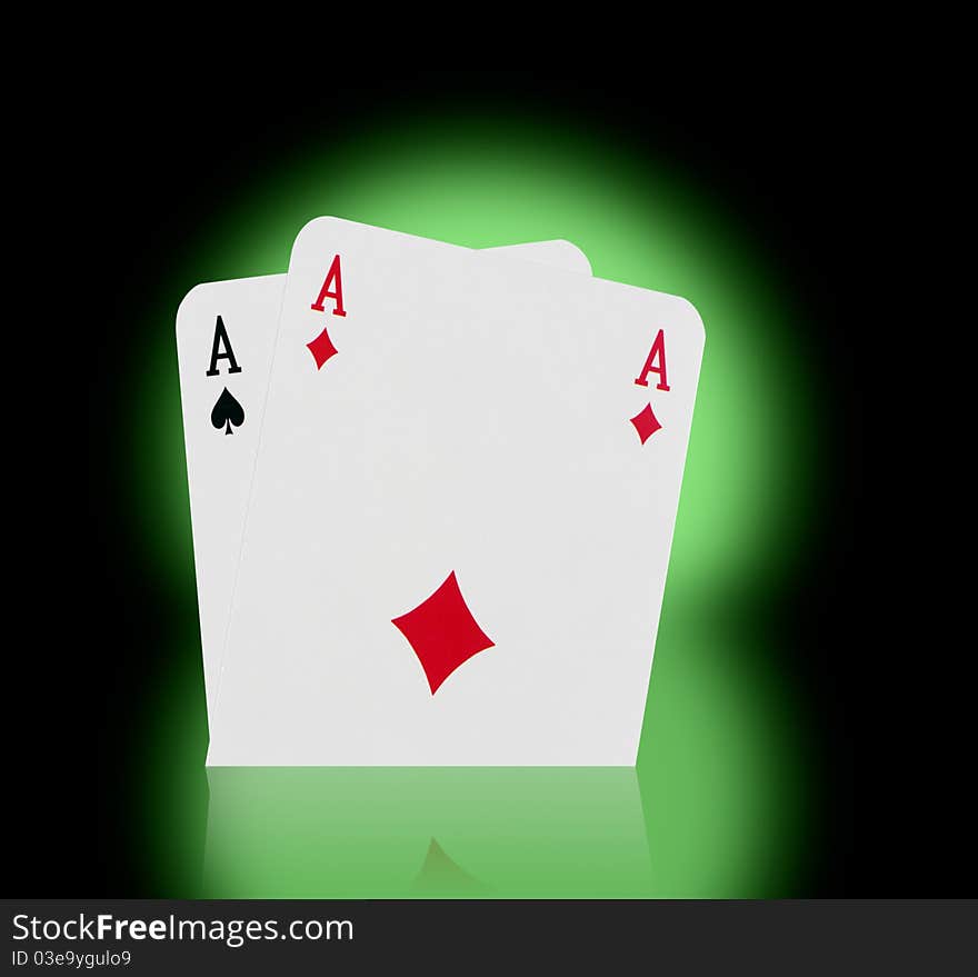 Playing cards on a green background