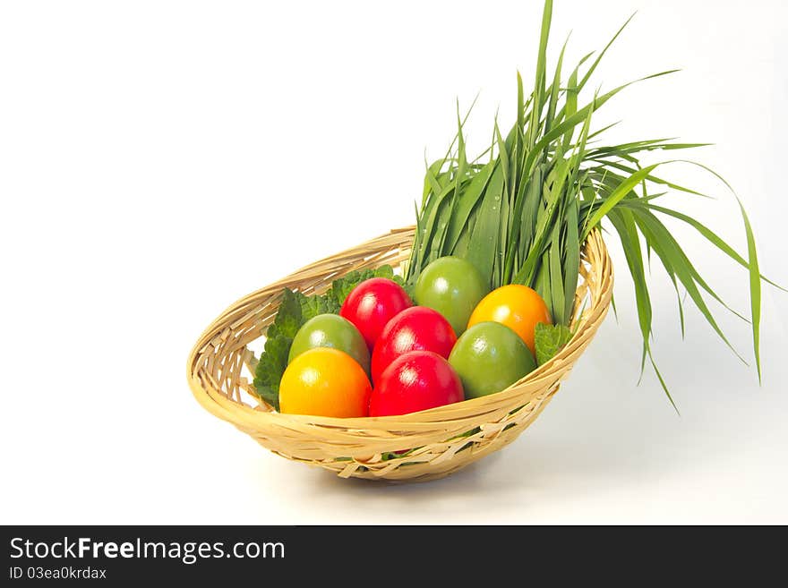 Easter basket, colored eggs with grass. Easter basket, colored eggs with grass