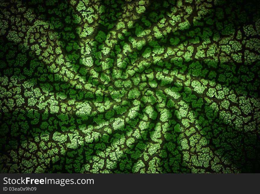 A green corrosion background or texture