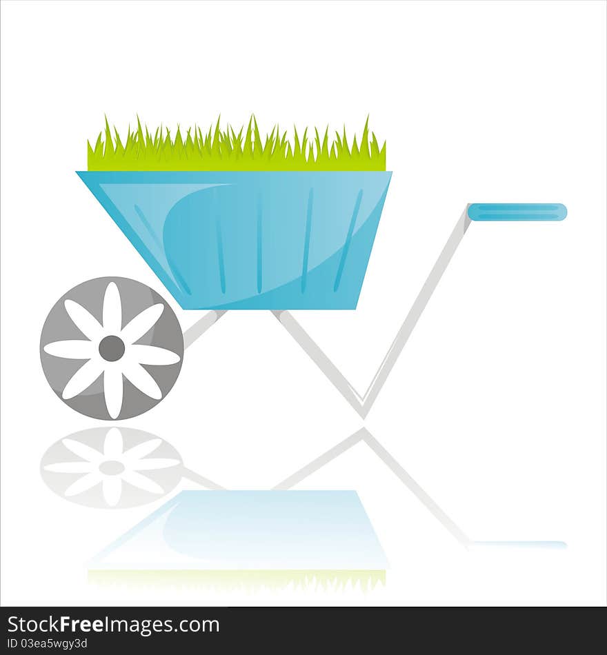 Garden wheelbarrow with grass isolated on white