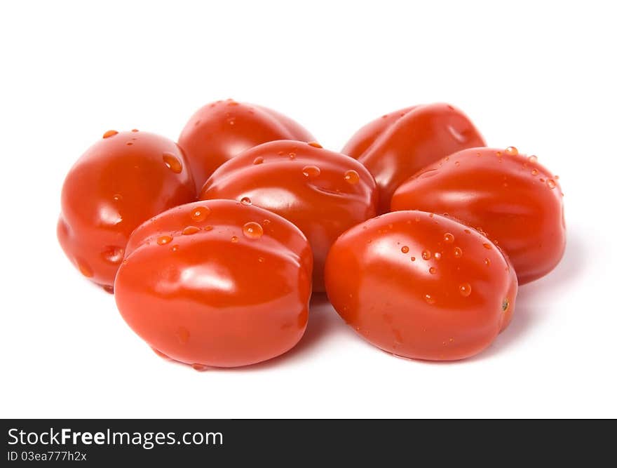 Red cherry tomatoes isolated on white