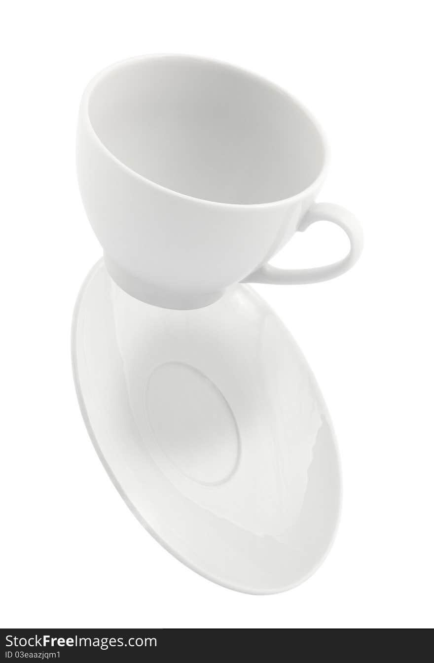 Falling coffee cup and saucer