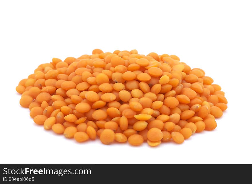 Red lentils isolated on white