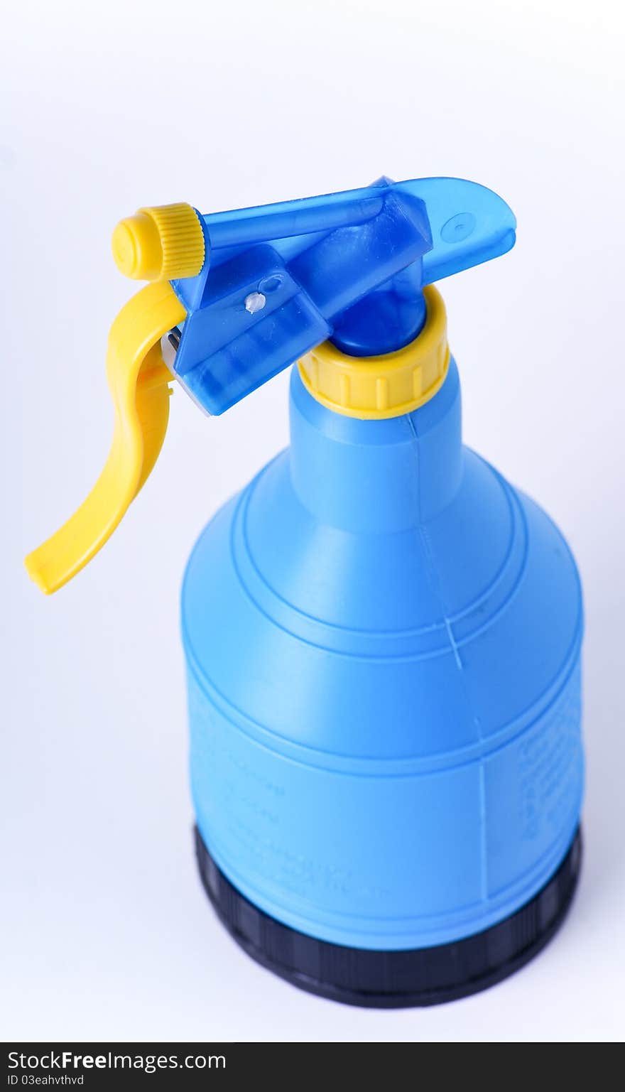 Blue bootle with sprayer isolated on the white background