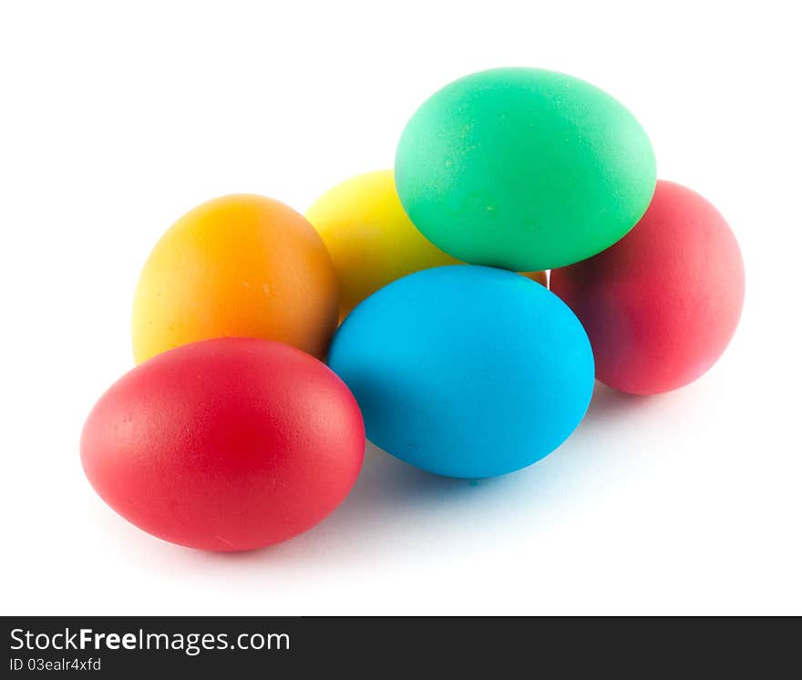 Many different color eggs over white background. Many different color eggs over white background