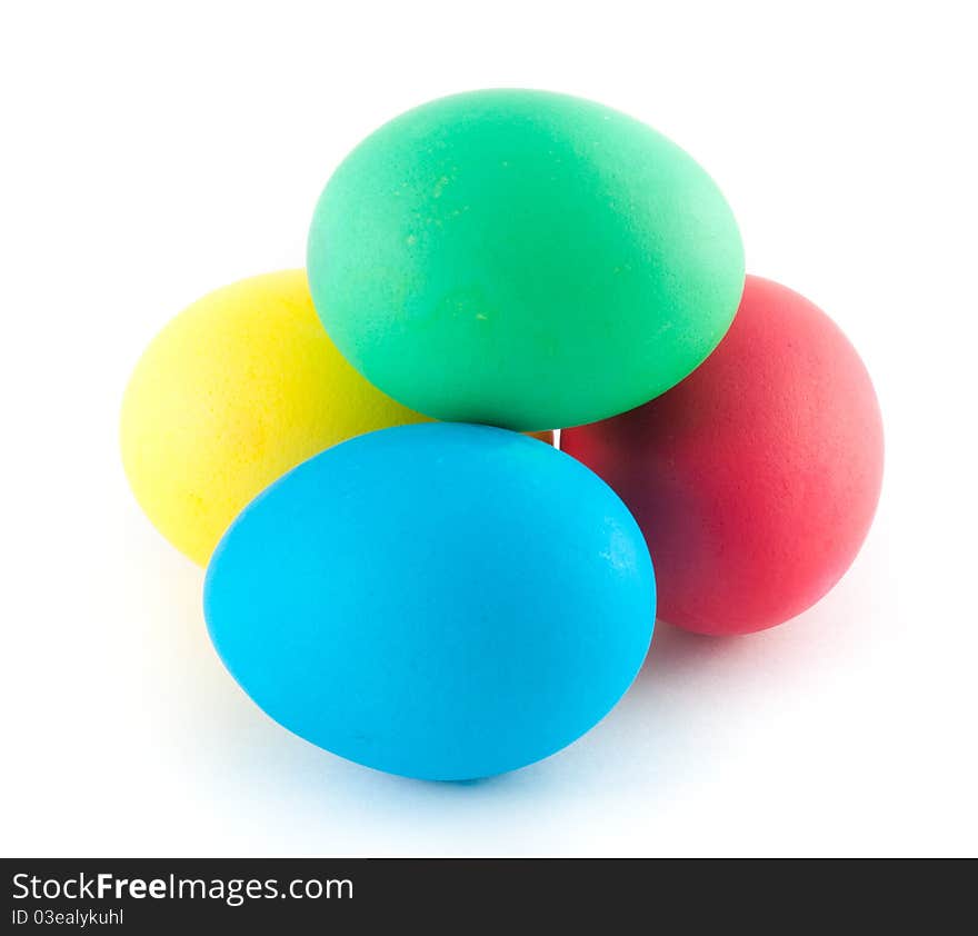 Many different color eggs over white background. Many different color eggs over white background