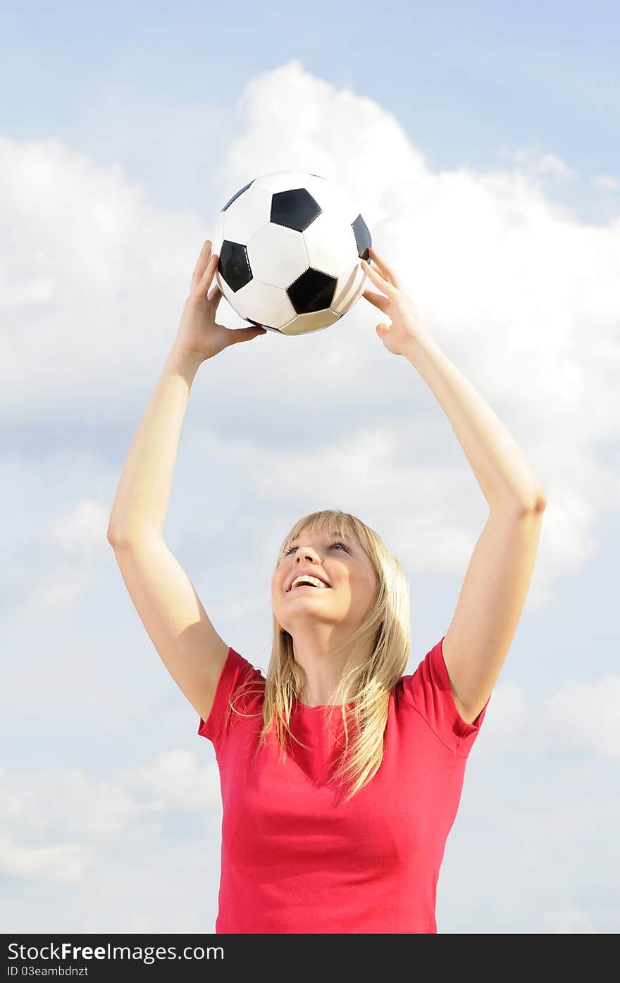 Young Woman With Soccer Ball