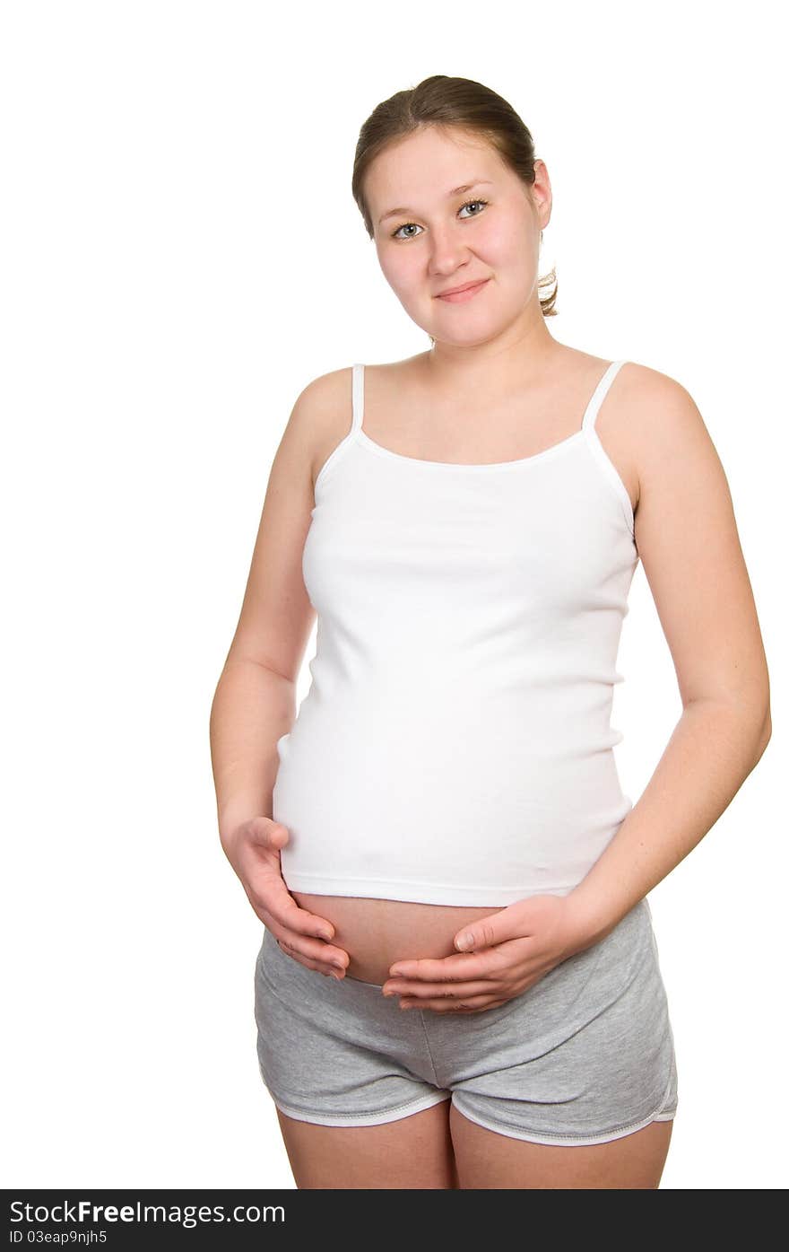 Attractive pregnant woman over white