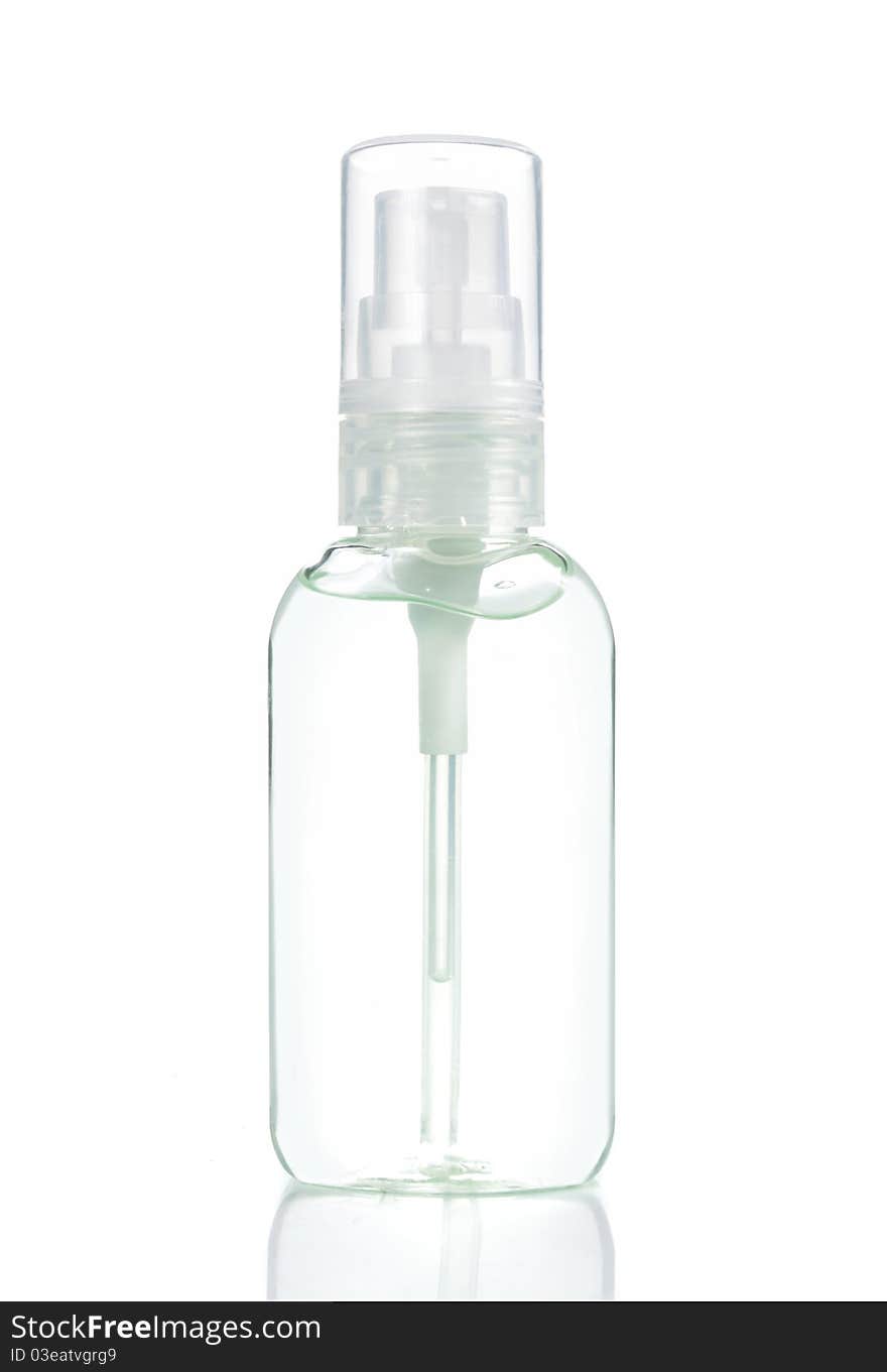 Transparent bottle isolated on white.