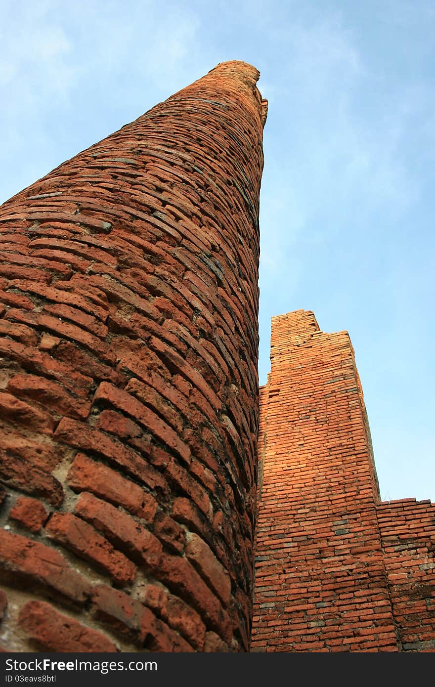 Old brick pillars of the temple in Ayutthaya, Thailand.