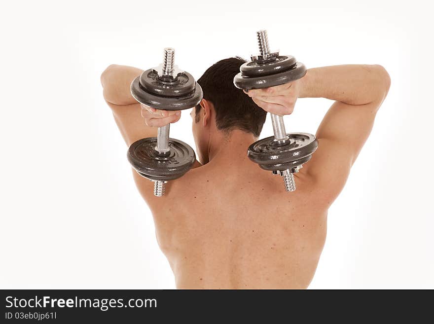 A man is shirtless and holding weights over his back. A man is shirtless and holding weights over his back.