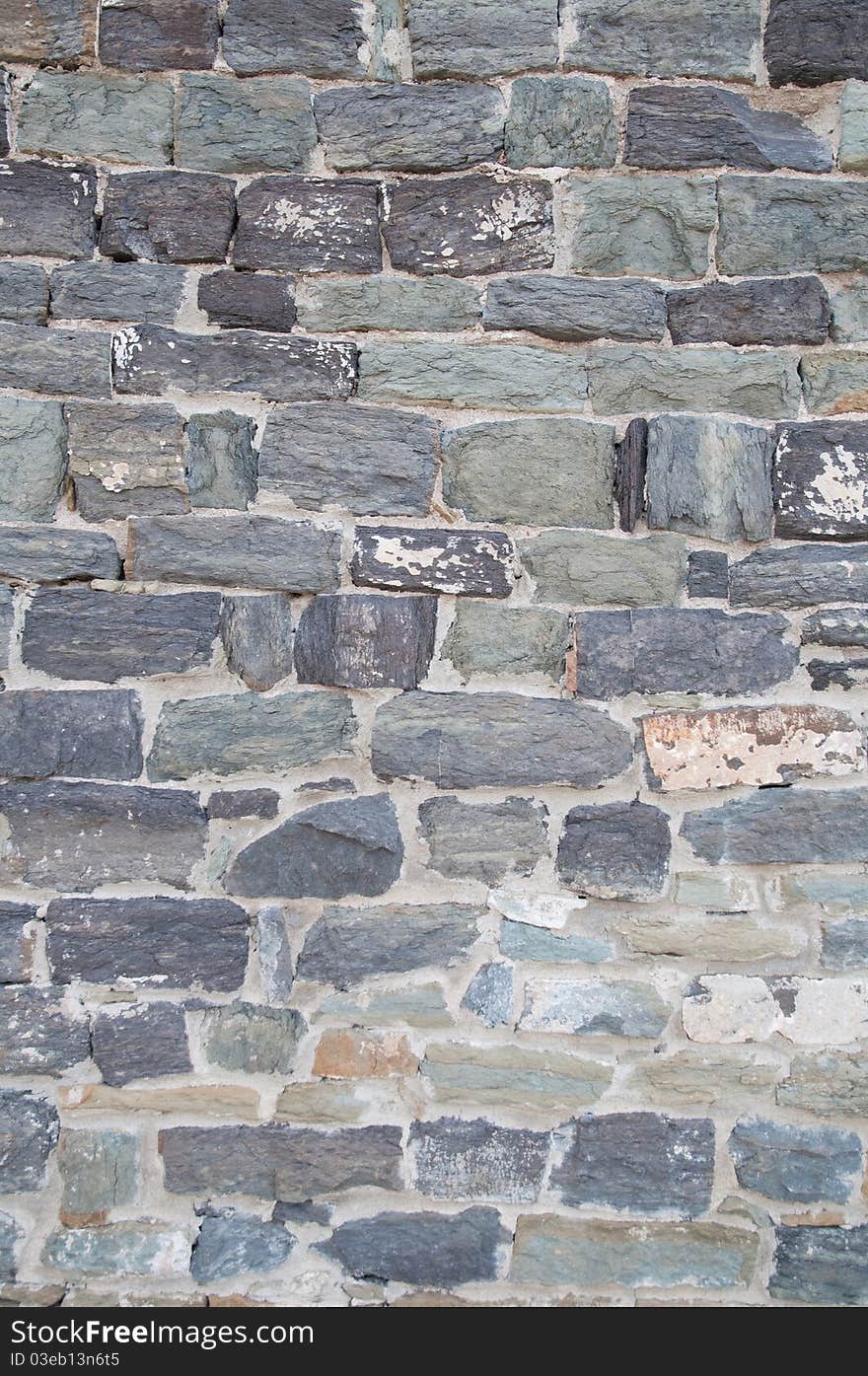 Old stone wall, flat stacked background and texture. Old stone wall, flat stacked background and texture.