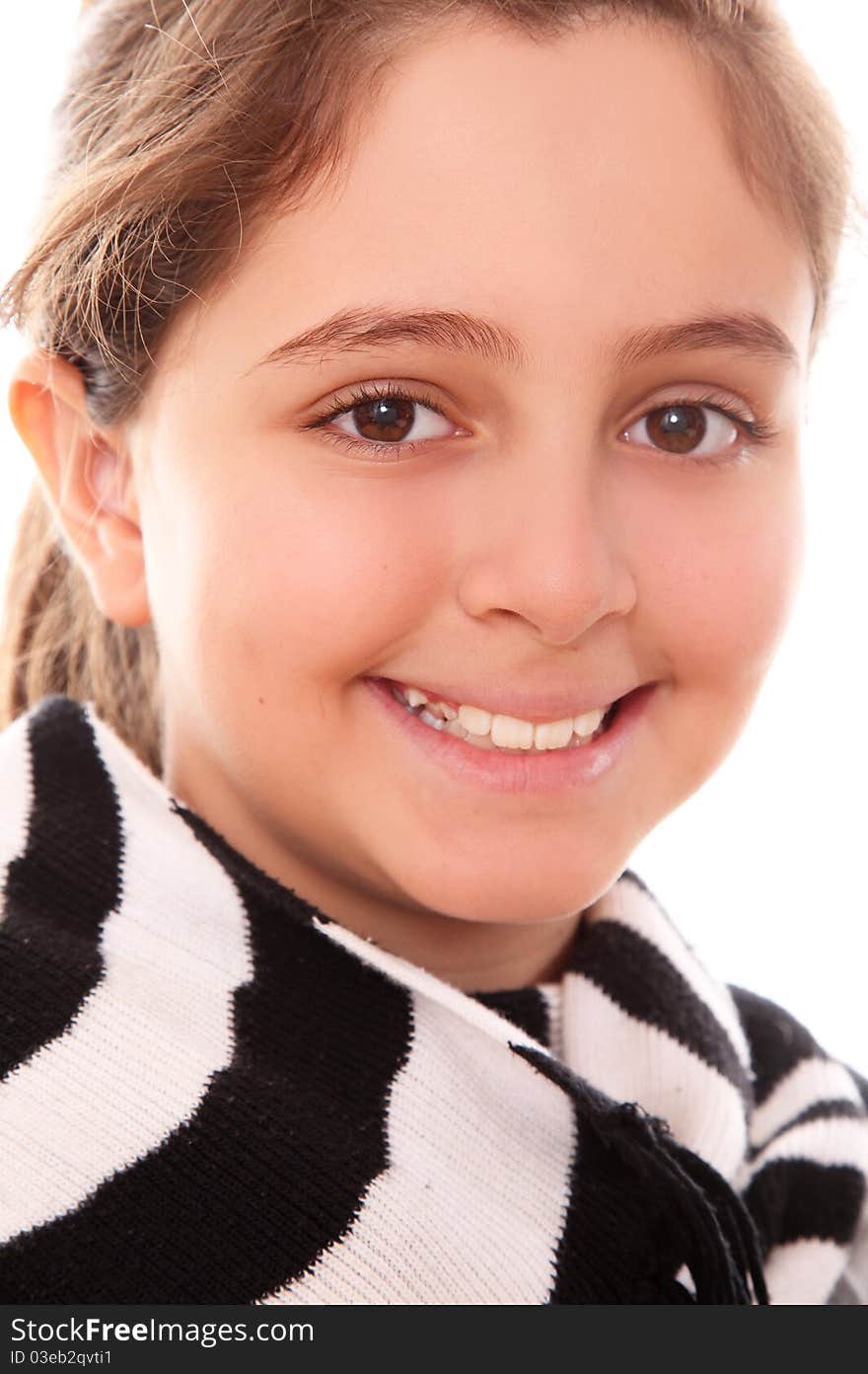 Beautiful girl smiling and looking at the camera with a scarf