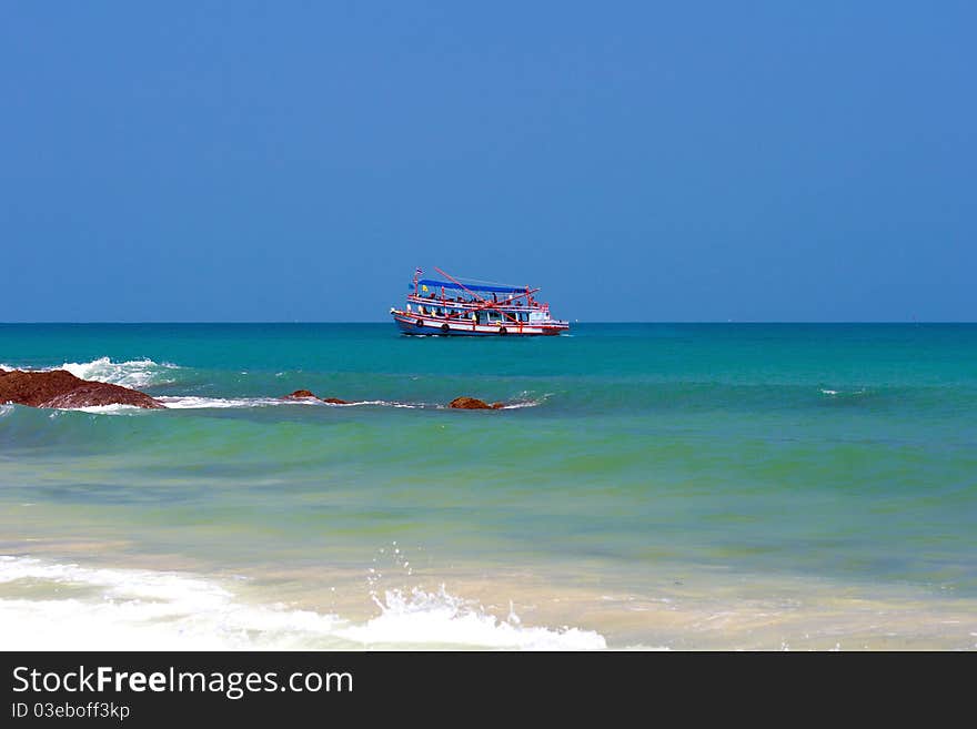 The boat dropped anchor off the island. The boat dropped anchor off the island