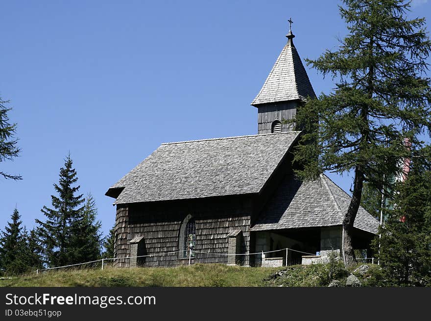 Wooden church in memory of the martyrs of World War to crossing between Austria and Italy in Passo Pramollo - Pontebba - Udine - Friuli - Italy.