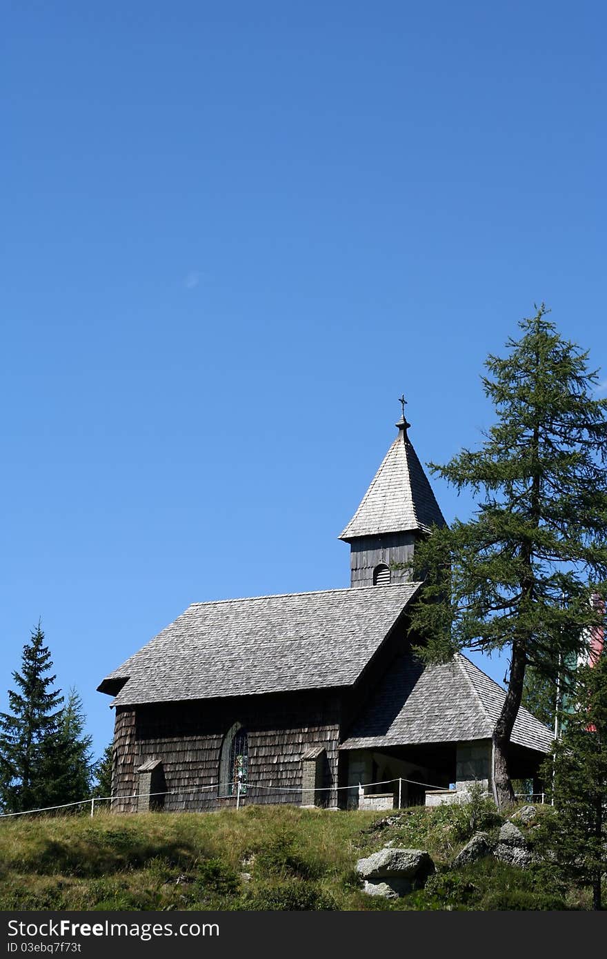 Wooden church in memory of the martyrs of World War to crossing between Austria and Italy in Passo Pramollo - Pontebba - Udine - Friuli - Italy.