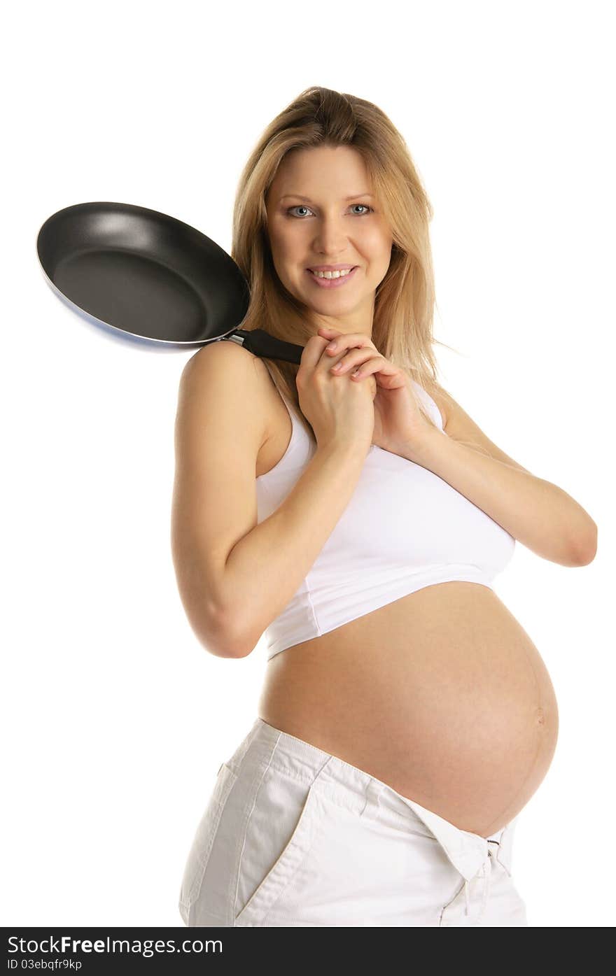 Happy pregnant woman with  frying pan isolated on white