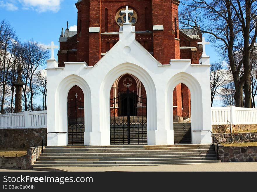 Entrance gate to the Catholic Church in Arch