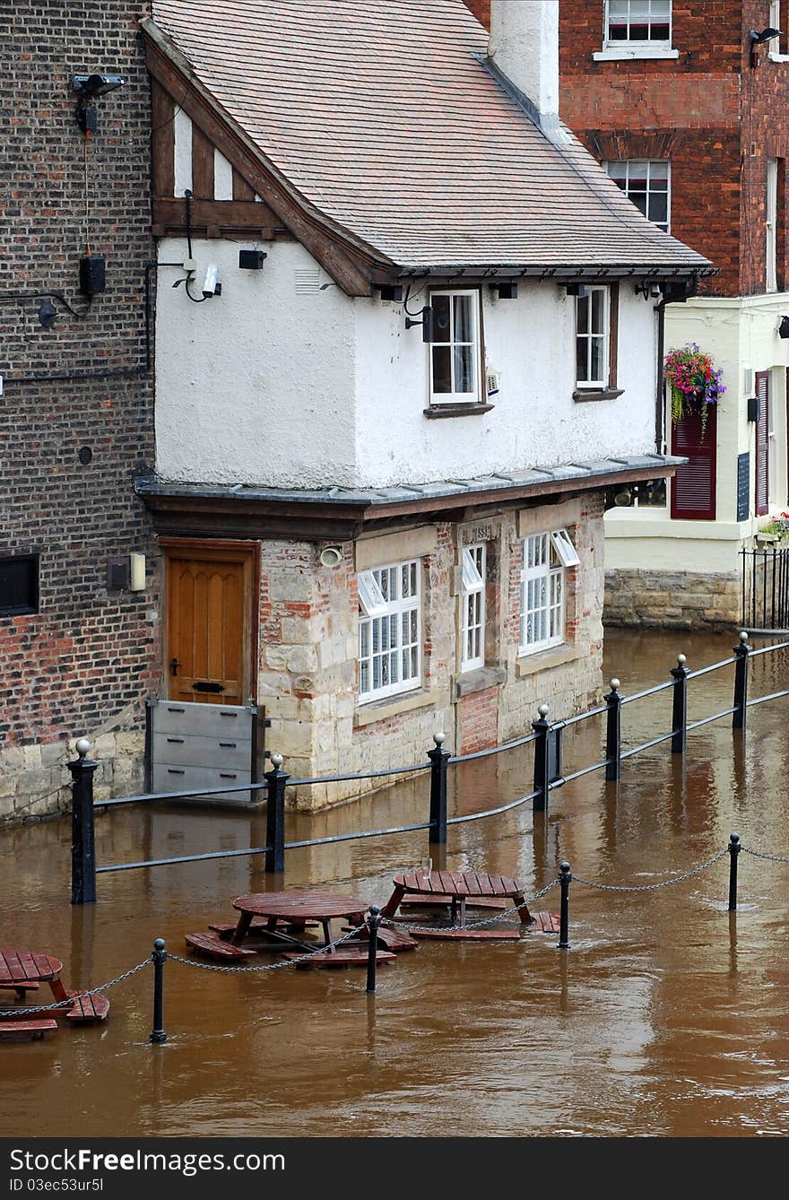 Rising flood waters on bank of Yorks River Ouse. Rising flood waters on bank of Yorks River Ouse.