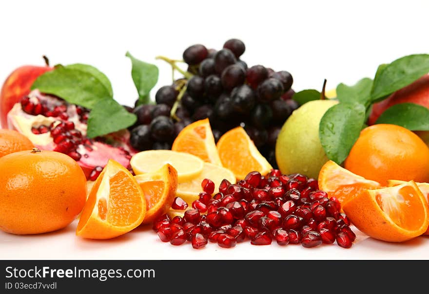 Ripe fruit on a white background