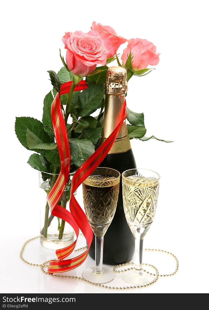 Champagne and roses on a white background