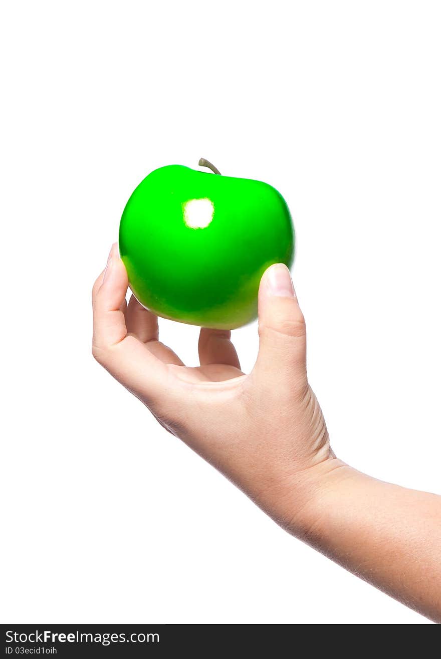 Someone holding a fresh green apple