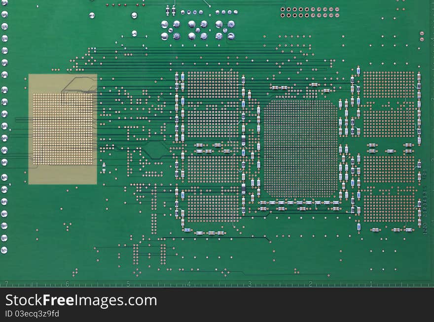 Back og an electronic board showing connections and soldering