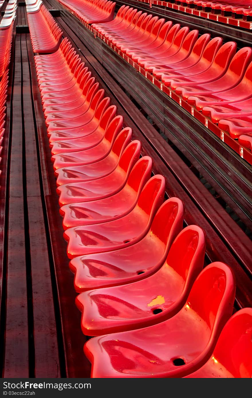 Red seats in football stadium