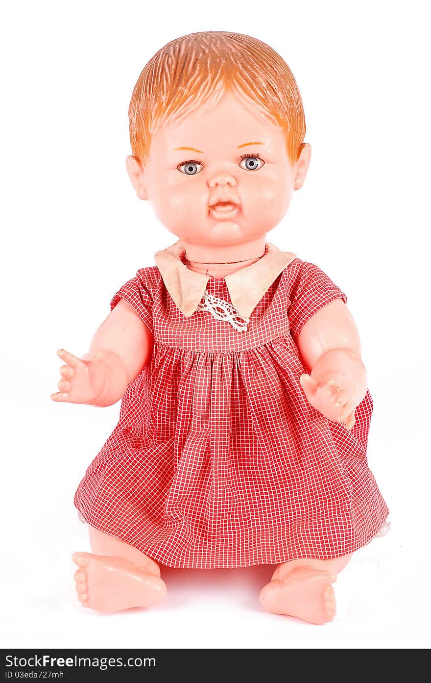 Antique doll isolated on a white background