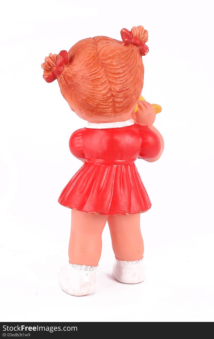 Rear rubber doll with red dress