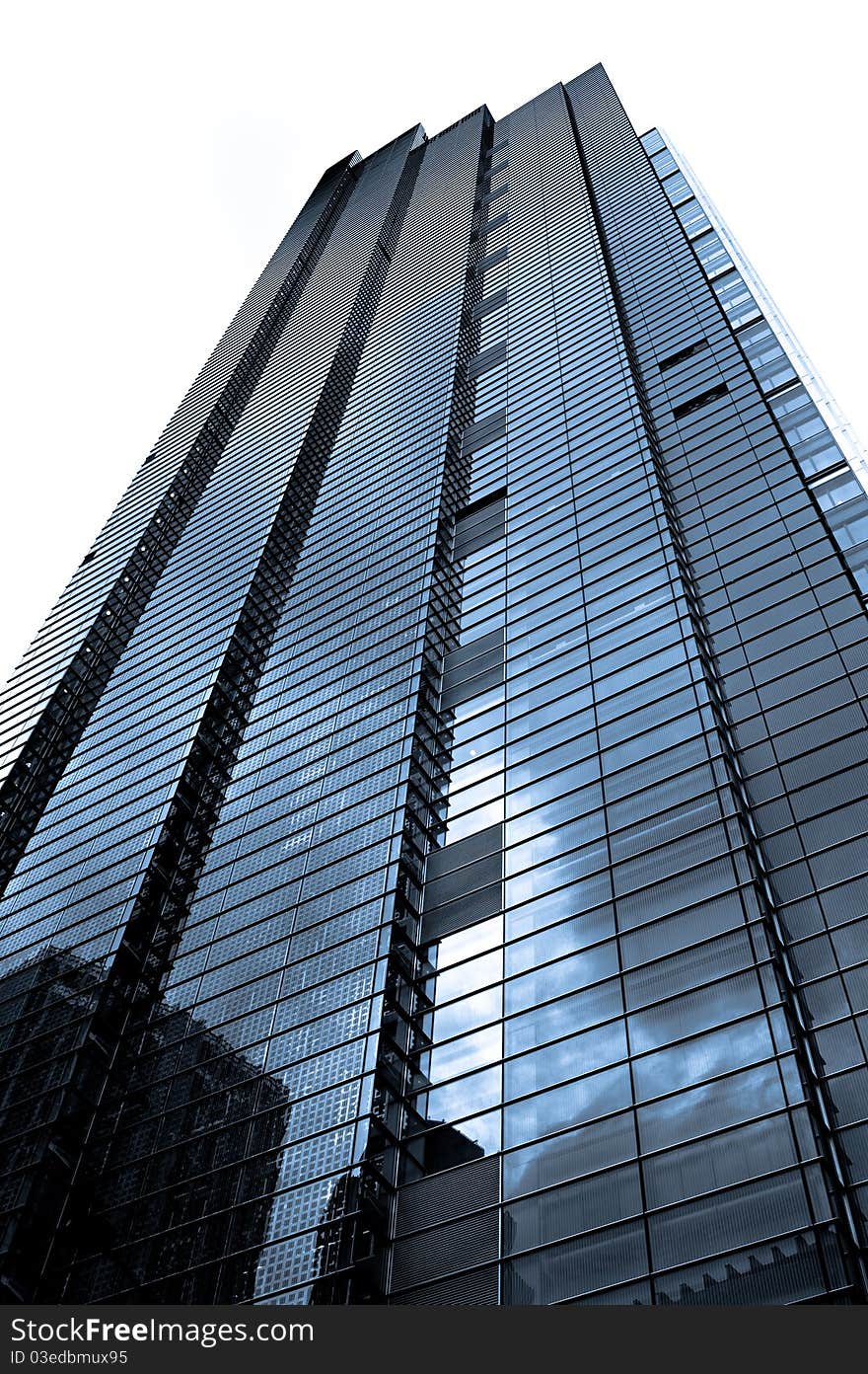 Glass and stell skyscraper in london isolated on white