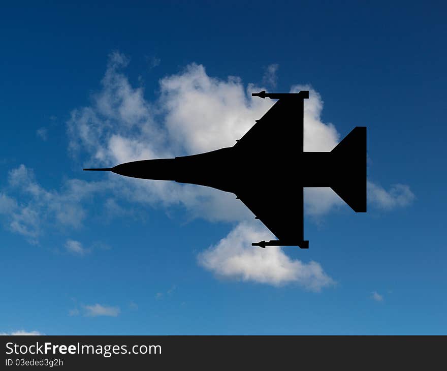 Aircraft silhouetted in a blue sky