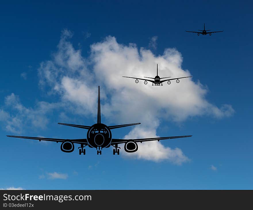 Aircraft silhouetted in a blue sky