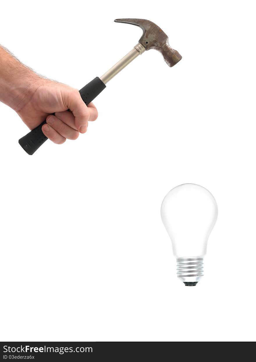 A light bulb being smashed with a hammer