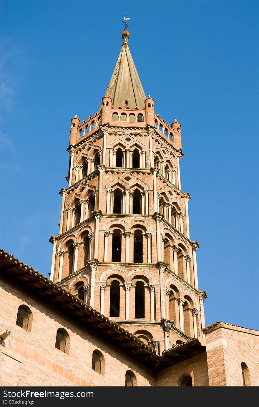 The basilica of Saint Sernin is a church (roman style) in Toulouse, south France.The bell tower is five tiers,octagonal and slightly inclined towards the west direction. The basilica of Saint Sernin is a church (roman style) in Toulouse, south France.The bell tower is five tiers,octagonal and slightly inclined towards the west direction.